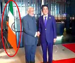 PM Narendra Modi in Malaysia: Indian flag upside down during Modi-Abe meet