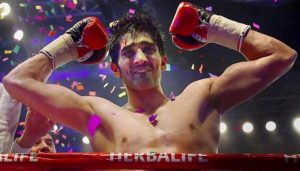 Vijender Singh defeats China's Zulpikar Maimaitiali by unanimous decision in Battleground Asia