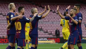 Barcelona beat Las Palmas behind closed doors amid Catalonia clashes.