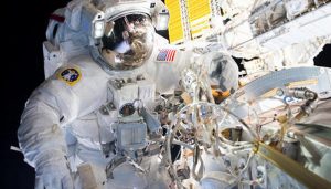 NASA astronauts set for first of three spacewalks to repair ISS.