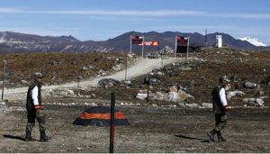 China amasses troops near Doklam, widens road.