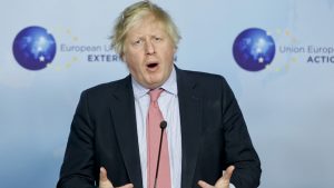 UK's Johnson threatens to purge rebel Brexit lawmakers from party.