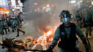 Hong Kong protesters plan to block one of world’s busiest airports after night of violence.