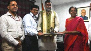 Nirmala Sitharaman hands over antique Buddha idol to Prahlad Singh Patel.