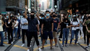 Hundreds return to Hong Kong streets as metro, shops shut after violence.