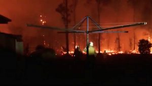 Australia orders evacuations as firefighters struggle to contain bushfires.