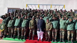 Rajnath Singh chants 'Bharat Mata ki Jai' with jawans at Bum La Pass in Arunachal Pradesh.