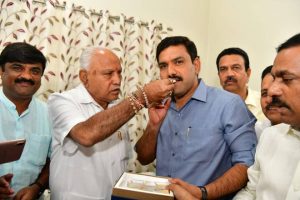 Karnataka bypoll results: BS Yediyurappa celebrates with son as BJP leads on 12 seats