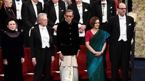 Dressed in dhoti and sari, Abhijit Banerjee, Esther Duflo receive Nobel Prize in Economics