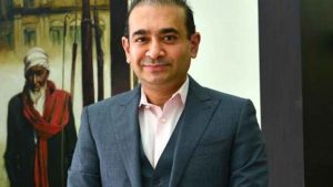 PNB scam accused Nirav Modi declared fugitive economic offender by PMLA court.