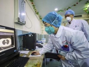 Coronavirus death toll nears 1,500 in China, new cases fall in Hubei