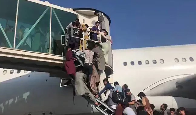 Afghanistan crisis: Chaos, panic as thousands gather at Kabul airport to flee country, US troops fire shots to disperse crowd