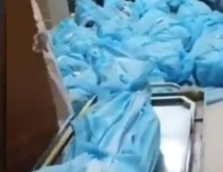 Covid outbreak in China: Dead bodies wrapped in blue plastic pile up on hospital floor