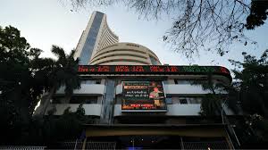 Sensex Opening Bell: ऊपरी स्तरों से बाजार में बिकवाली; रिकॉर्ड छलांग के बाद सेंसेक्स-निफ्टी लाल निशान पर