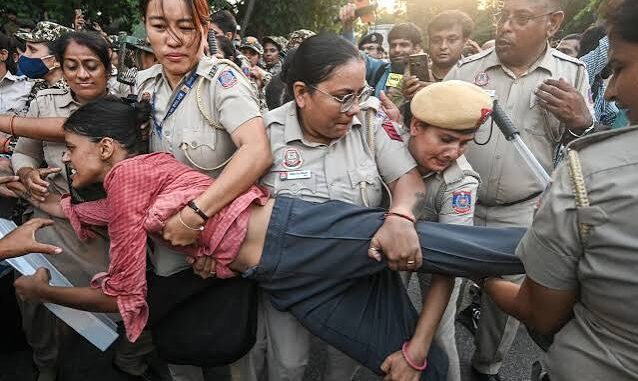 Why are Delhi Police stripping their name tags at Jantar Mantar? The secret tactic explained